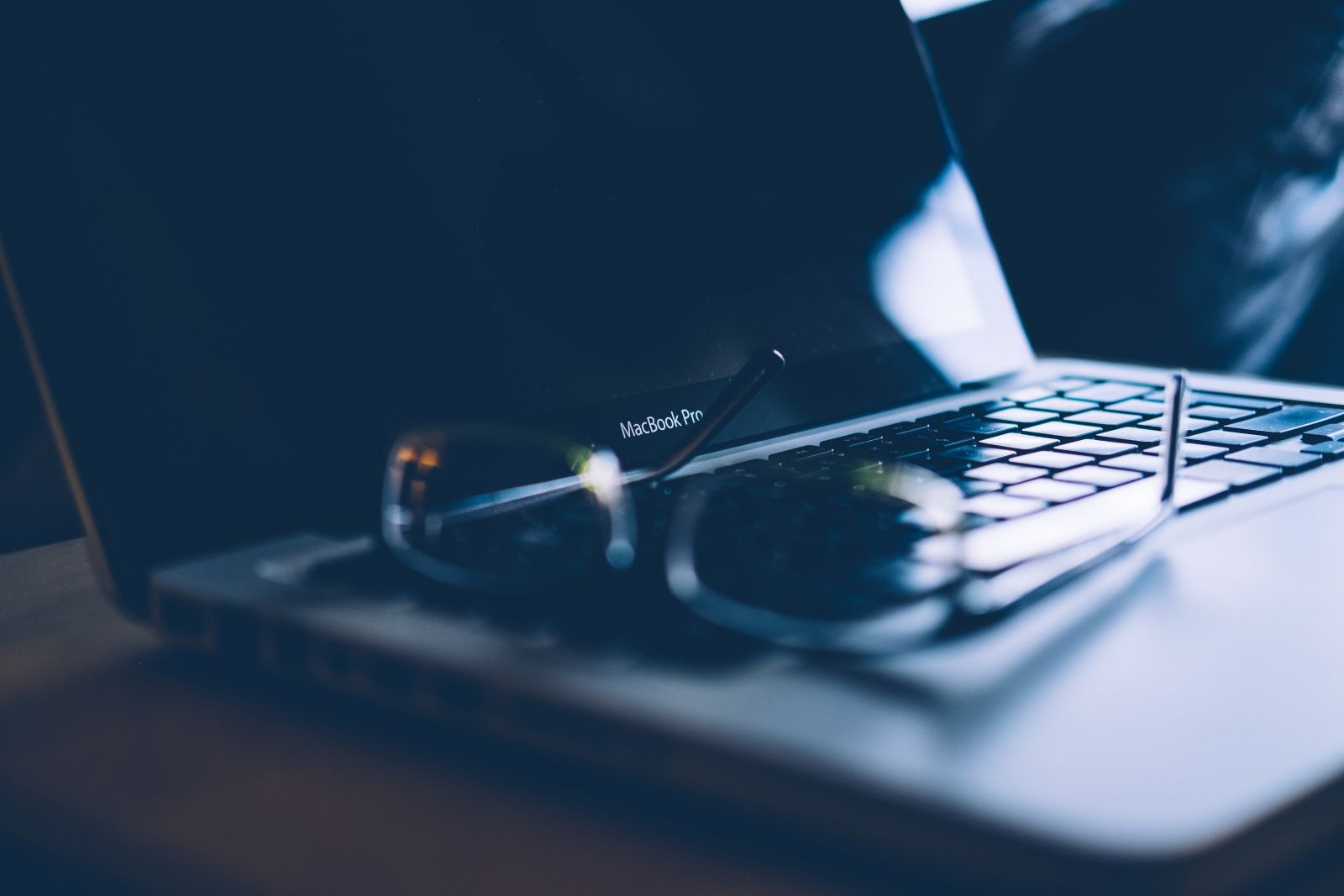 Reading glasses on a laptop computer